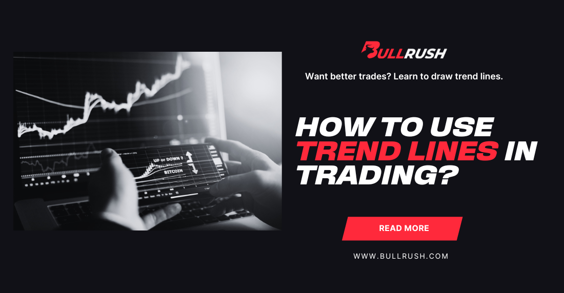 Black and white image of hands holding a tablet displaying a fluctuating stock chart. Text reads: "How to Use Trend Lines in Trading?" with a "Read More" button.